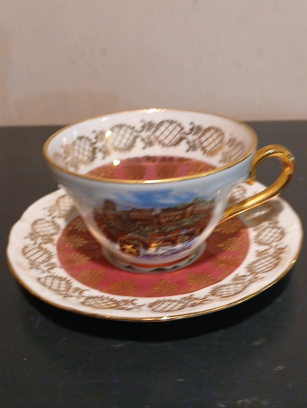 Gold-Trim Porcelain Teacup and Saucer Made In Germany in Red, White and Gold